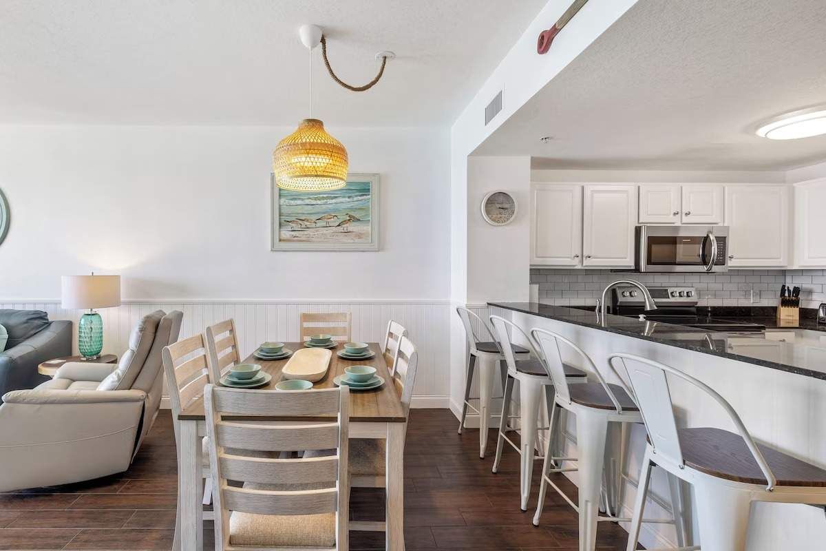 Dining Table seats 6 and a bar that seats 4.  